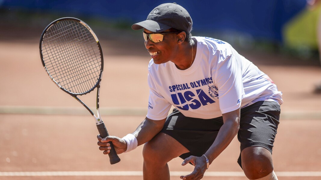 USA female athlete Loretta Claiborne wearing white jersey in action