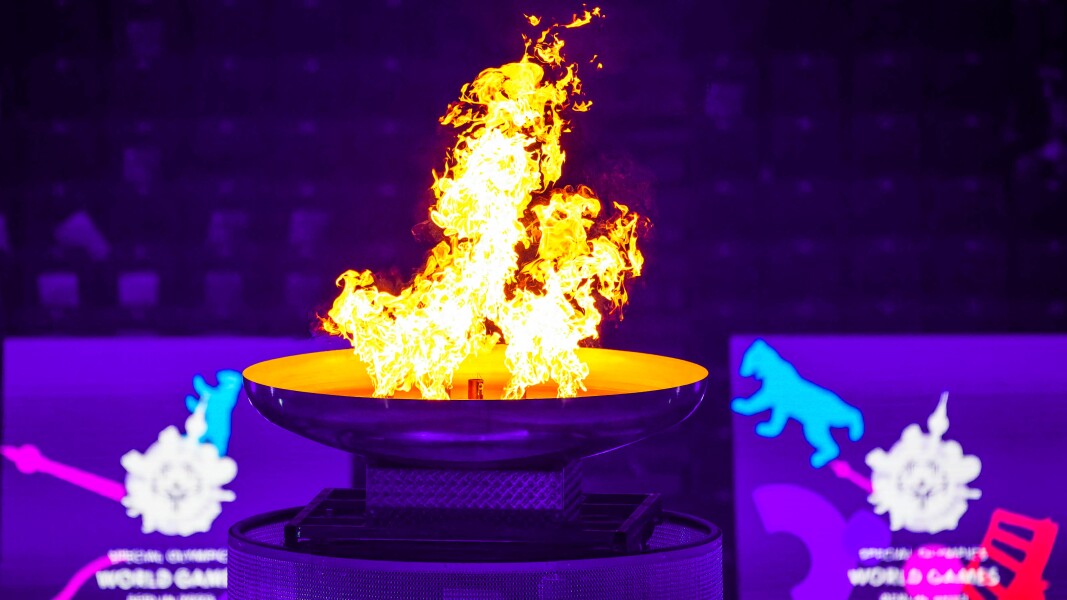 The photo shows the lit flame in the fire bowl. From Athens to Berlin to the Olympiastadion.