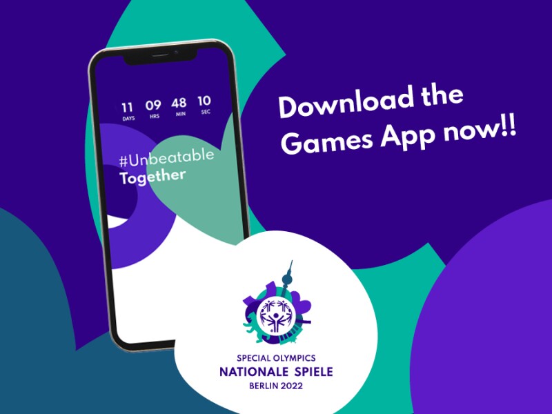 The graphic consists of various National Games logo elements. On it is a cell phone and next to it, it says"Download the Games App now!!".