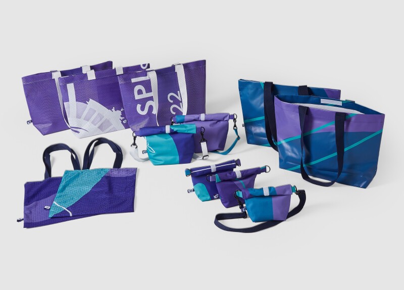 Das Foto zeigt verschiedene Taschen, die alle aus Materialien der Banner der Special Olympics Nationalen Spiele Berlin 2022 hergestellt worden sind.