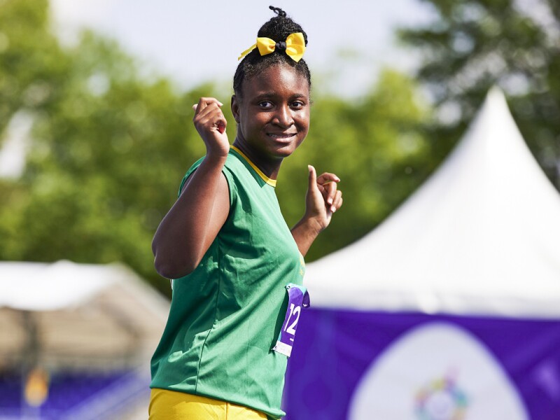 On the picture is Jamaican athlete Sheneel Williams posing for cameras with a smile on her face.