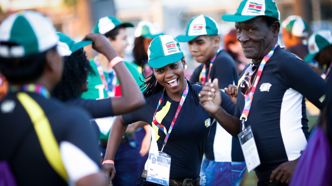 In the photo athletes celebrate and dance exuberantly