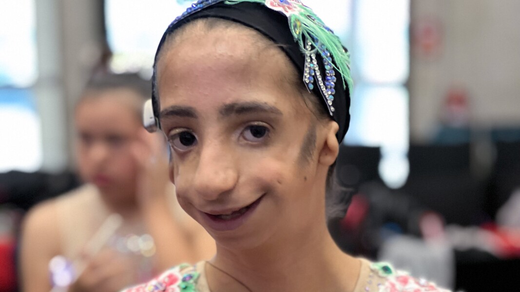 On the picture you can see Valery Vera, the youngest athlete at the rhythmic gymnastics competition.