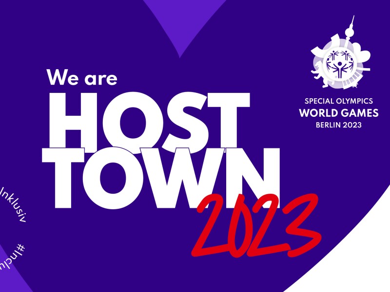 The graphic shows a purple heart with "We are Host Town 2023" written on it. In addition, the hashtag #InclusiveTogether can be seen at the bottom left and the World Games logo at the top right.