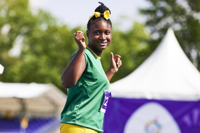 On the picture is Jamaican athlete Sheneel Williams posing for cameras with a smile on her face.