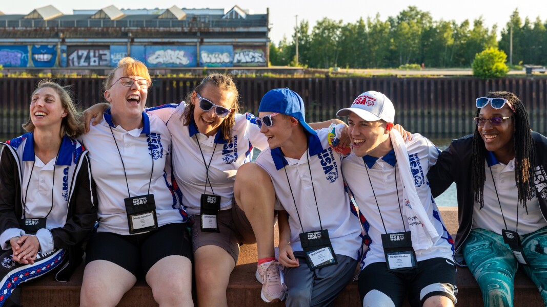 On the photo you can see some SO USA athletes having fun and sitting on a wall.