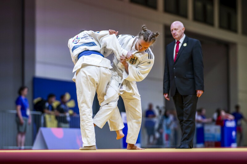 Two players competing with each other Judo competition