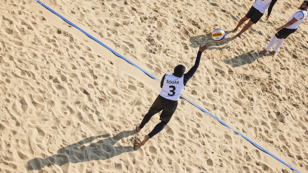 SO UAE beach volleyball player retuns a shot during the first semifinal of the men's/mixed unified sports team competition against SO Germany.