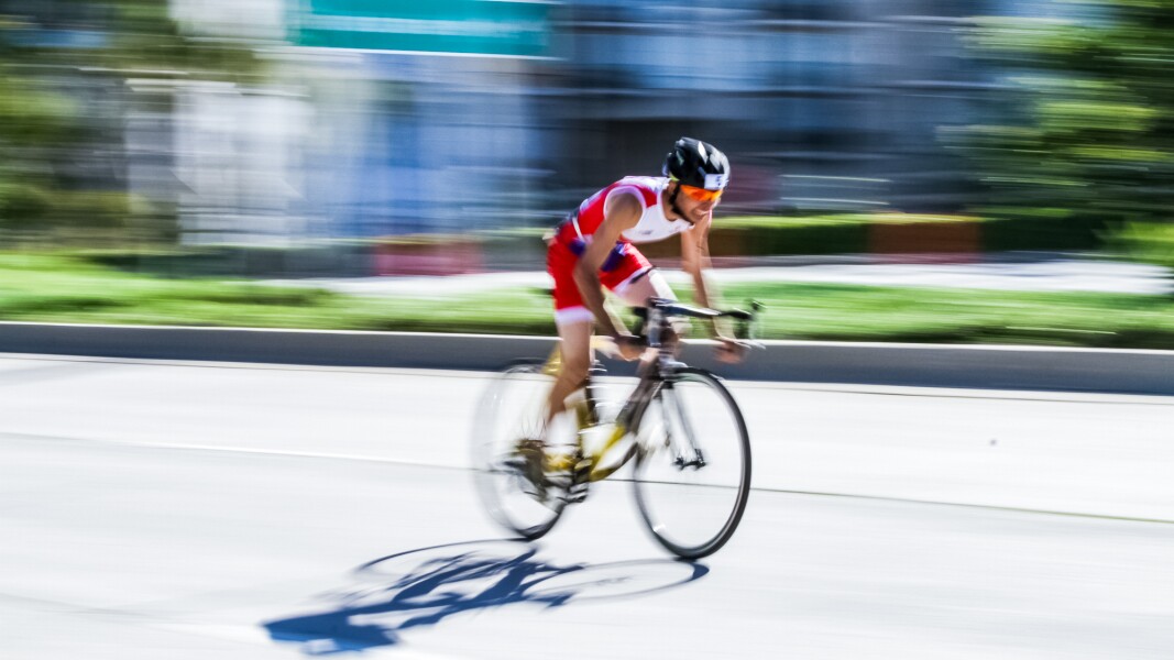 The photo shows a cyclist during competition.