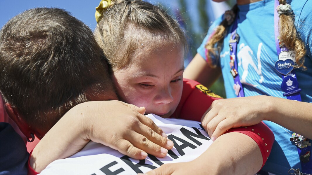 Annabelle, an athlete hugging after award ceremony