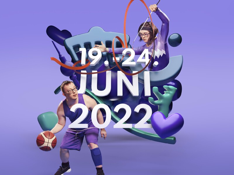 Das Bild ist eine Mischung aus Grafiken und Fotos, die zusammen mit dem Schriftzug "19.-24. Juni 2022" das Motiv der Eventkampagne der Nationalen Spiele ergeben. Die Fotos zeigen eine Athletin und einen Athlet, die Grafiken sind Logoelemente wie der Berliner Bär in verschiedenen Lilatönen.