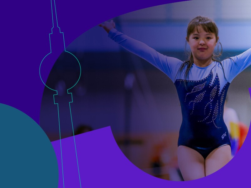 The graphic includes several logo elements of the National Games Berlin 2022 logo, and a photo of a gymnast is also added.